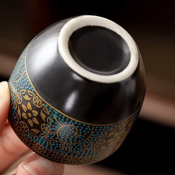 Kungfu theepot met roterend schenksysteem en keramische kopjes